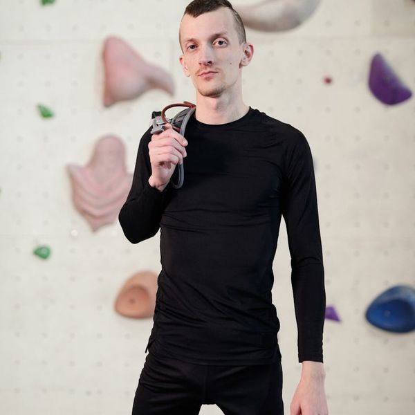 Confident man looking energetic after a workout session.